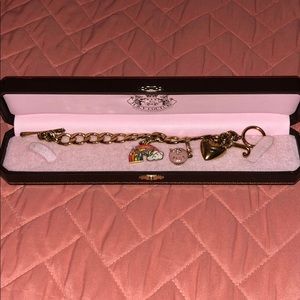 Gold plated bracelet with 2 charms